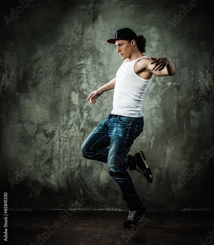  Man dancer showing break-dancing moves