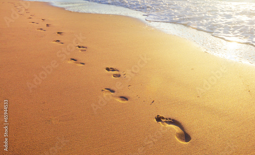 Fototapeta beach, wave and footprints