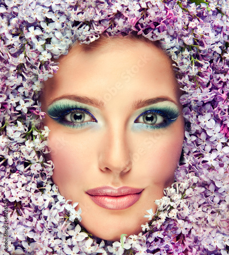 Fototapeta Beautiful fashionable portrait , model of flowers lilac .