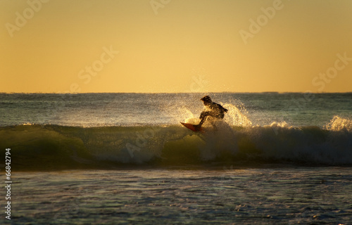  Surfer carving the wave