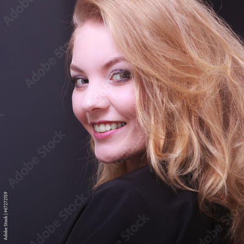 Beautiful smiling girl with blond hair by hairdresser 