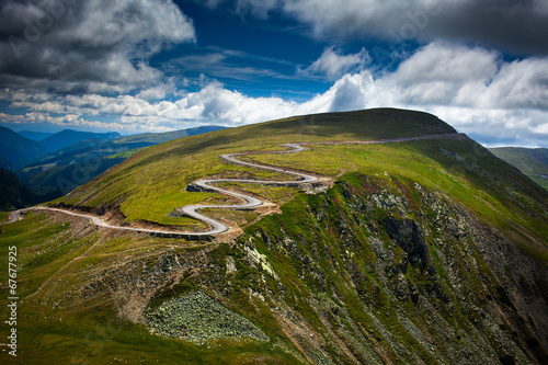 Winding road on mountain © xalanx