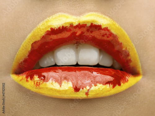 Beauty photo (close-up) of red/yellow female lips. Poster