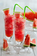 Frozen watermelon juice drink in glasses with straws