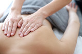 Close up of back massage procedure in spa salon poster