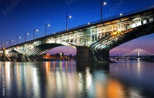 Obraz na płótnie Two bridges illuminated in Warsaw