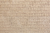 Egyptian hieroglyphs stone background
