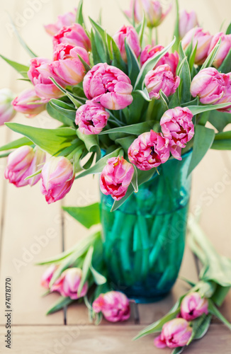 Bouquet of beautiful pink tulips in vase