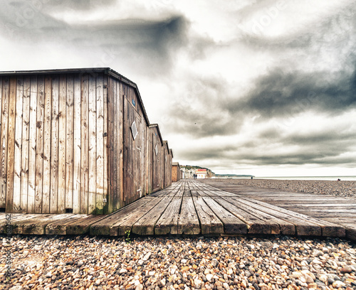 Wooden cabins along a beautiful beach