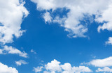 White clouds in blue sky. poster
