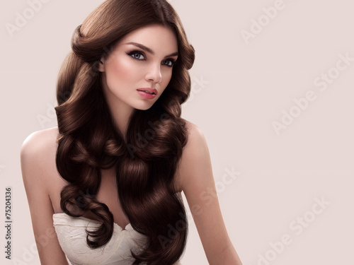 Zdjęcia Hair. Portrait of Beautiful Woman with Long Wavy Hair. High qual