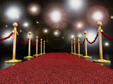 Red carpet at night with flashlights poster