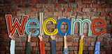 Group of Hands Holding Word Welcome poster