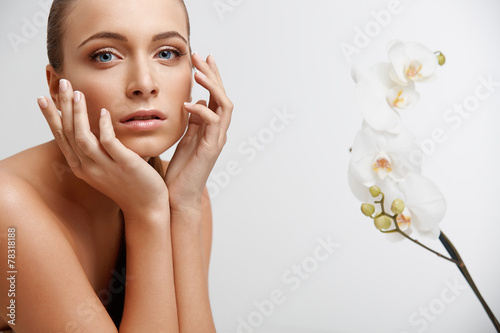 Poster Spa Woman. Beautiful Girl Touching Her Face. Perfect Skin.