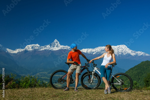 Fototapeta Biker family in Himalaya mountains, Anapurna region