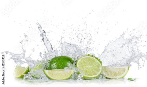 Limes with water splash
