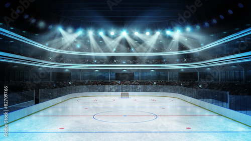  hockey stadium with spectators and an empty ice rink