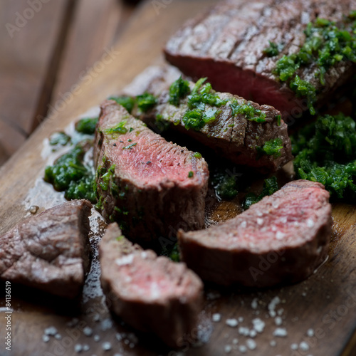 Zdjęcia Medium rare grilled beef barbecue steak with chimichurri sauce