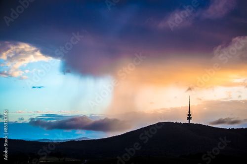 Zdjęcia Rain clouds accumulated behind the Black Mountain in Canberra, Australia in the
