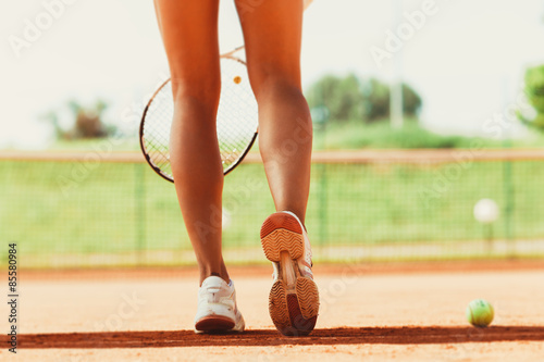Obraz na plátně Legs of female tennis player.Close up image.
