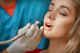 Woman patient at dentist <b>dental clinic</b> teeth care - 160_F_86083580_K4PEpN4WDm4AatBqvCB2SmE3opXWHdzS