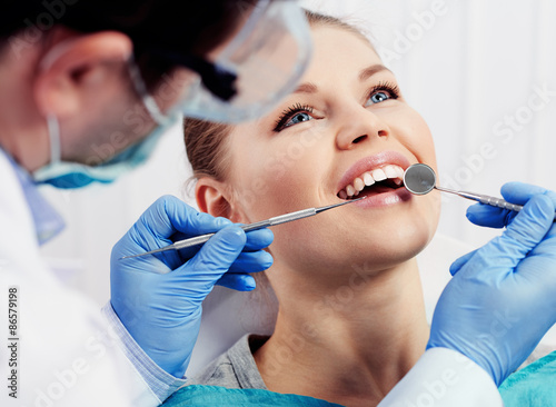Zdjęcia Caries protection. Tooth decay cure. Female patient at dentist