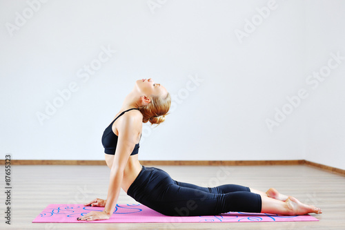 Zdjęcia Woman in the cobra yoga pose