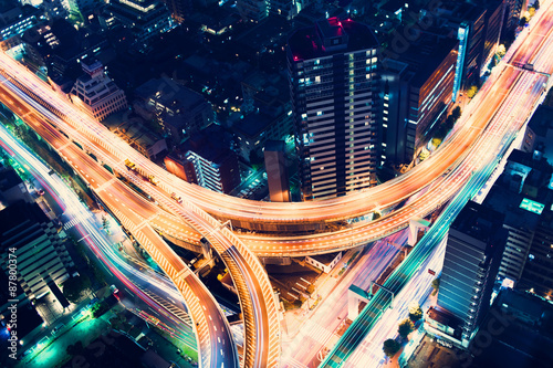 Aerial-view highway junction at night in Tokyo, Japan