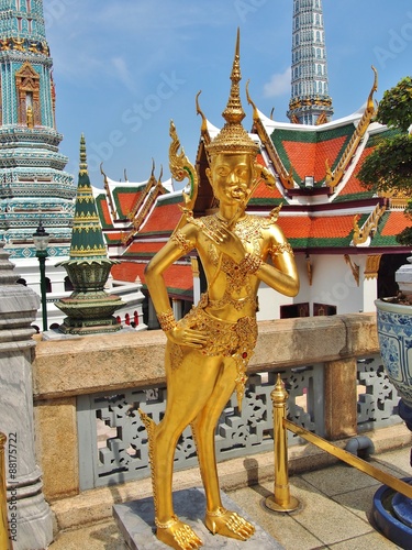 Poster A Golden Kinnara statue at the Temple of the Emerald Buddha (Wat Phra Kaew), Grand Palace in Bangkok Thailand