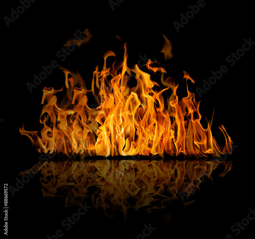 dark and bright orange fire on black with reflection
