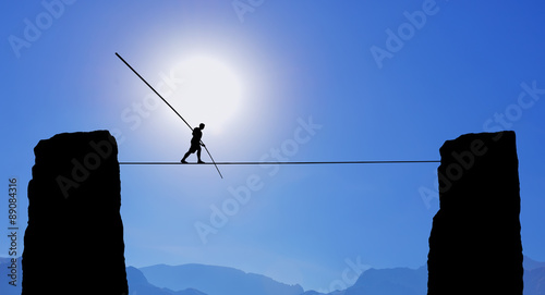 Tightrope Walker Balancing on the Rope