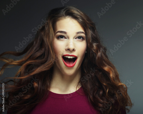 Young happy woman <b>with wind</b> in hair - 500_F_90432513_ivWFcZNKxjhDXaVFNLfDk1qM6OKG53ee