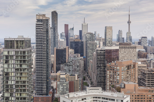 Poster Cluster of high-rise buildings in Downtown Toronto on the background of Toronto sky