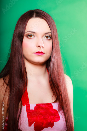 Long haired woman in summer dress.