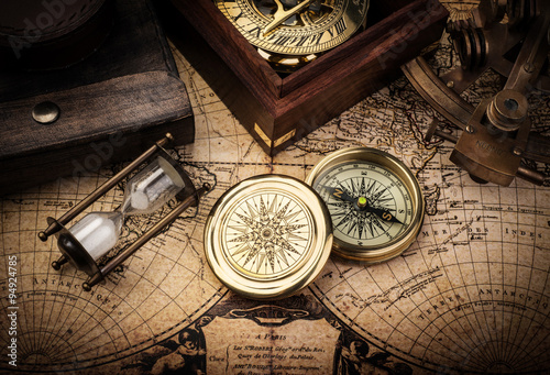 Poster, Tablou Old compass, astrolabe on vintage map. Retro stale.