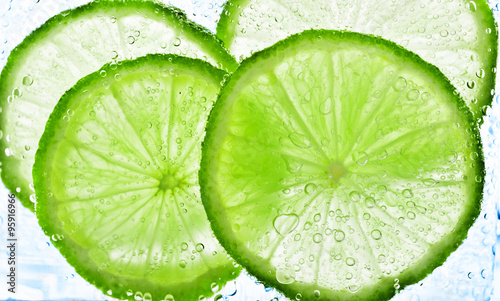 lime with bubbles isolated on white