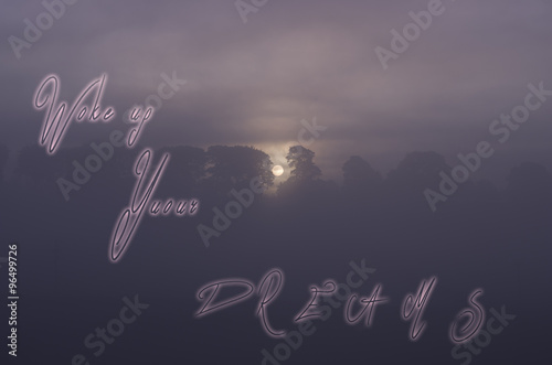 Poster Sentence Wake up your dreams handwritten on sunsets morning background