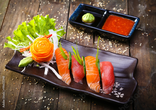Japanese Salmon, tuna sushi and sauce closeup
