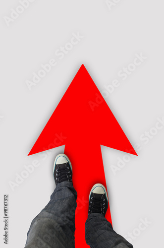 standing arrow concrete of shoes : background Pair on road standing with on shoes concrete on a  for