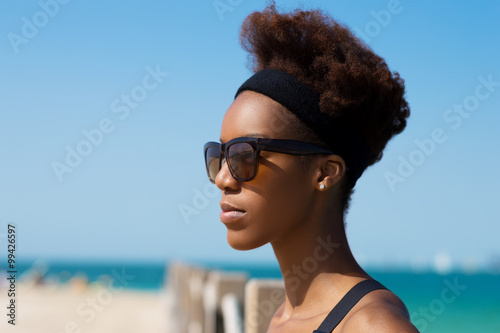 &quot;Woman standing <b>near water</b> at the beach&quot; Stock photo and royalty-free images ... - 500_F_99426597_gyTXv4R2bQQT4I10NfnlOnMOLHijMnMs