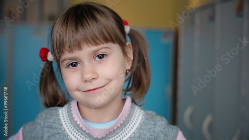 "Beautiful girl with pigtails look at the camera" Material 