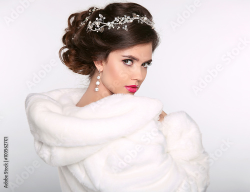 Winter beauty woman in white fur coat. Fashion model portrait. J
