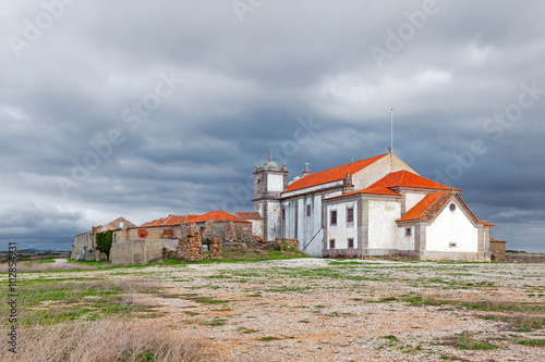 Poster Back of the baroque church in the Sanctuary of Nossa Senhora do Cabo, aka Nossa Senhora da Pedra Mua, with ruins