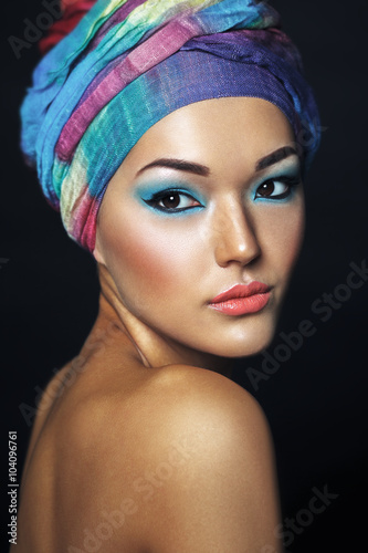 "Beautiful asian woman with turban or hijab. Etnic beauty 