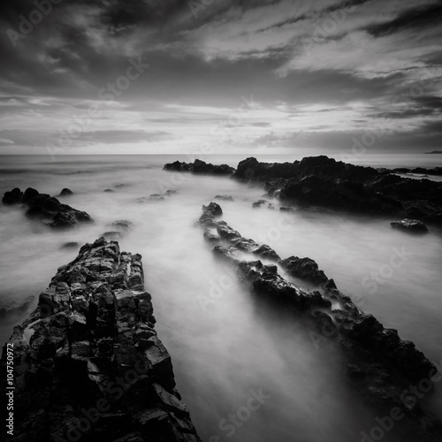 Poster Long exposure and black and white image of Rocky Beach