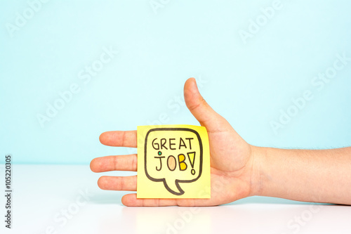 Poster Hand showing a message with great job / well done. Award concept