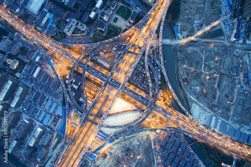 aerial view of traffic on road junction at night in hangzhou