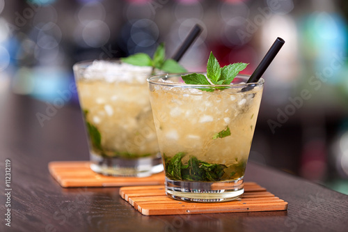 Zdjęcia Two cocktails Mint Julep on a bar counter. Horizontal shot