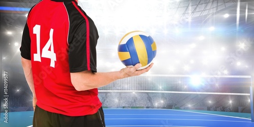 Composite image of sportsman holding a volleyball Poster