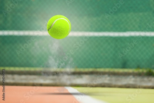 Obraz na plátně Composite image of tennis ball with a syringe